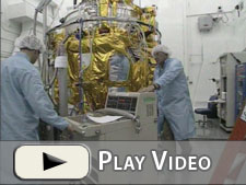 Spacecraft arrives in a satellite pre-launch    preparation room at Vandenberg Air Force Base, CA