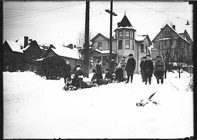 File:Children sledding on residential street, Seattle, ca 1920 (MOHAI 2837).jpg