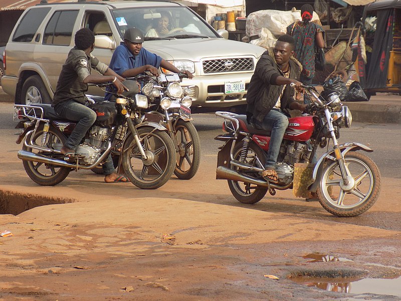 File:Adeolu segun 14 bike man, boxer seller, insecticide seller.jpg