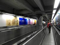 The moving walkway connecting the premetro station with the metro station