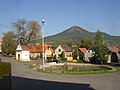 Village square in Vchynice (view from SE, Lovoš (570 m) in the background)