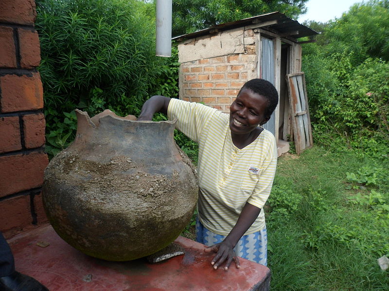 File:A beneficiary showing us how she uses her handwashing facility (7608525386).jpg