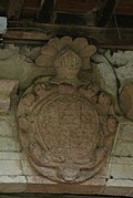 Detalle del escudo del palacio de los Riego y Tineo (El Barreiro) de Tuña.