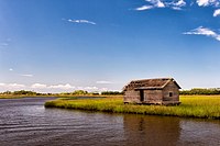 The Bald Head Creek Boathouse on Smith Island, North Carolina Author: Rhgibbs