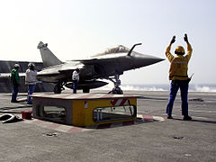 A French Navy Rafale is launched from the FS Charles De Gaulle (R91)