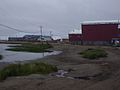 The school (blue), lake, and condemned old school (red)