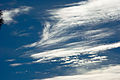 Cirrocumulus lacunosus (at the center of image)