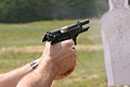 M9 during firing with cartridge being ejected