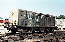 Class 15 locomotive ADB 968003 at Finsbury Park Depot in 1977. It still carries the outdated British Railways green livery and lion crest