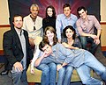 Firefly cast. (From left to right, top to bottom) Adam Baldwin, Ron Glass, Summer Glau, Tudyk, Sean Maher, Jewel Staite, Morena Baccarin, and Nathan Fillion at the 2005 Serenity "flanvention".