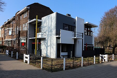 De Stijl – Rietveld Schröder House in Utrecht, Netherlands, by Gerrit Rietveld (1924)[63]