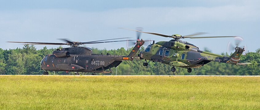 German Army (Heer) NHIndustries NH90 TTH (reg. 78+31) and German Army Sikorsky CH-53G Super Stallion (reg. 84+99, sn V65-97) at ILA Berlin Air Show 2016.