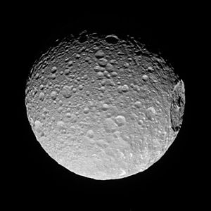 The side of Mimas that always points away from Saturn, imaged by Cassini on November 19, 2016 at a distance of 85,000 kilometres (53,000 miles).[41]