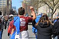 Stoneman Douglas t-shirt and raised fist in Washington, DC