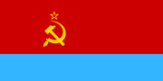 Early variant of the flag of the Ukrainian SSR, before the unification of the hammer and sickle[6]