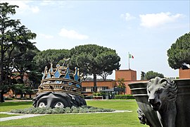 Decorative elements from Fellini's Casanova on the entrance lawn of the studios