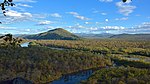 Mountain scenery with forests and rivers