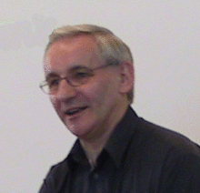 Head shot of a man wearing spectacles