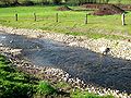 Oksbæk nord for byen (i naturreservatet omkring Sønder Brarup Ås)