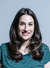 Photographic portrait of a young woman with long dark hair