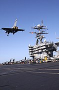 A French Rafale M performs a fly-by pass over the USS John C. Stennis (CVN-74)