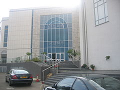 Entrance to the main mosque with a view of the glass entrance.