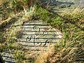 The Victorian-era reproduction of the Swastika Stone on Ilkley Moor, which sits near the original to aid visitors in interpreting the carving