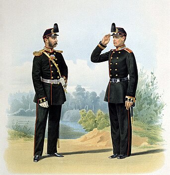 Officer och kadett i uniform modell 1864 med vapenrock och käppi med paradtillbehör i form av plym och plåt.