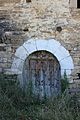 Puerta d'una casa en l'Atiart.