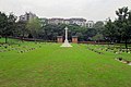 Burials and cross, font view