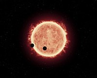 Ảnh mô phỏng các hành tinh quay quanh sao lùn siêu mát trong hệ TRAPPIST-1[9]