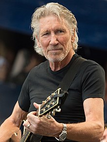 Roger Waters playing guitar