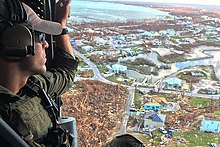 View of tropical cyclone damage from a helicopter