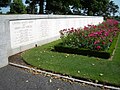 Retaining wall with the inscribed names of the missing.