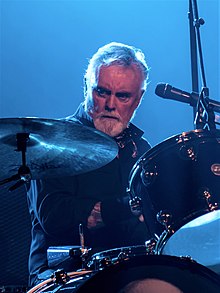 Taylor performing with Queen + Adam Lambert in 2017