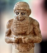 Sumerian dignitary, Uruk, circa 3300-3000 BCE. National Museum of Iraq.[48][49]