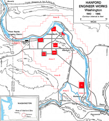 A contour map showing the fork of the Columbia and Yakima rivers and the boundary of the land, with seven small red squares marked on it