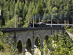 Semmering_-_Sonderzug_mit_Dampflok_109-13_und_Nachschiebe-E-Lok_auf_dem_Adlitzgrabenviadukt.jpg