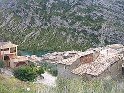 A picture of Sopeira as seen from the road, with the Noguera Ribagorzana at the background