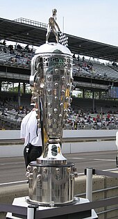 The silver Borg-Warner Trophy on display at the Indianapolis Motor Speedway