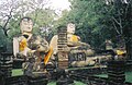 Wat Phra Kaeo, un Bouddha couché et deux Bouddhas assis