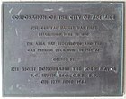 Plaque marking the opening of the redeveloped Adelaide Central Market Buildings by Lord Mayor James Irwin on 17 June 1966. Currently located at the Grote Street entrance.