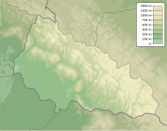 Mapa konturowa obwodu zakarpackiego, u góry nieco na lewo znajduje się czarny trójkącik z opisem „Piniaszkowy”