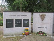 On a memorial to victims killed at Genshagen (right panel), where the letters KZ are not nationality-letters but rather are the German abbreviation for Konzentrationslager (concentration camp)