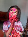 Littile Girl Playing Holi with Gulaal