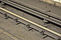 Third rail (top) with cover at Bloor-Yonge station