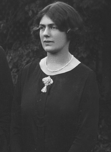 Black and white image of Joan Lindsay, posed in a black blouse