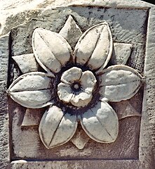 Stone relief of a flower