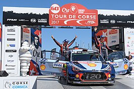 Winnaars Neuville en Gilsoul op het podium