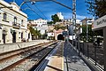 Estació de Sant Pol mirant cap al túnel, Al fons l'església de Sant Pau